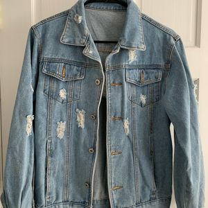 Ripped jean jacket light wash